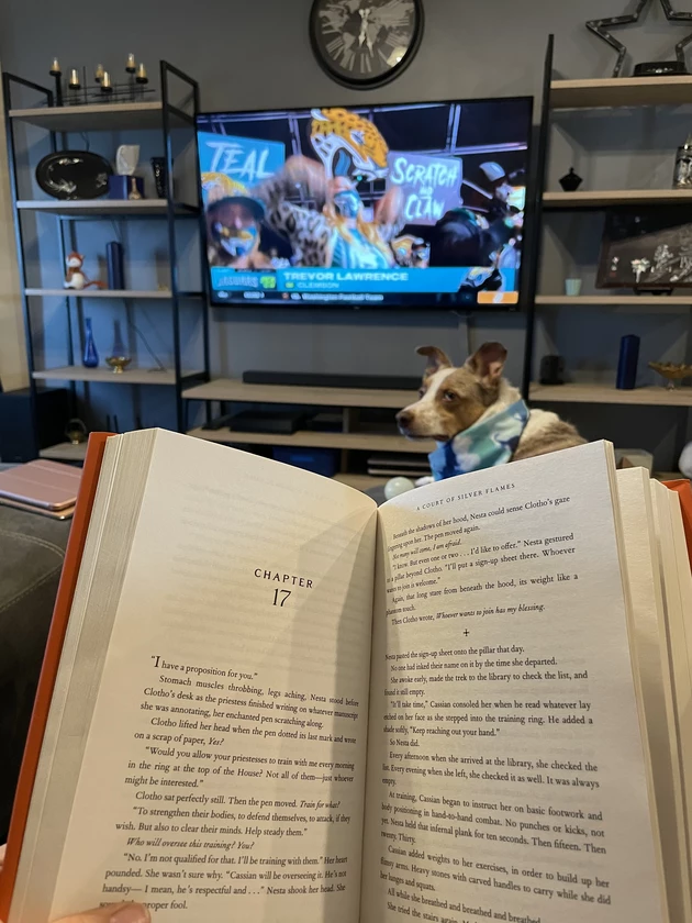 Chillin', watching football and reading a Sarah J. Maas book back in 2019. Credit: TSM